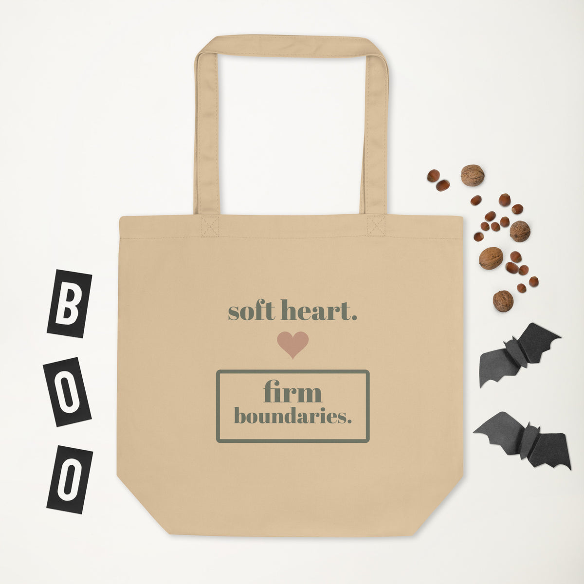 Soft Heart, Firm Boundaries Tote in natural oyster, laid flat with a few small props