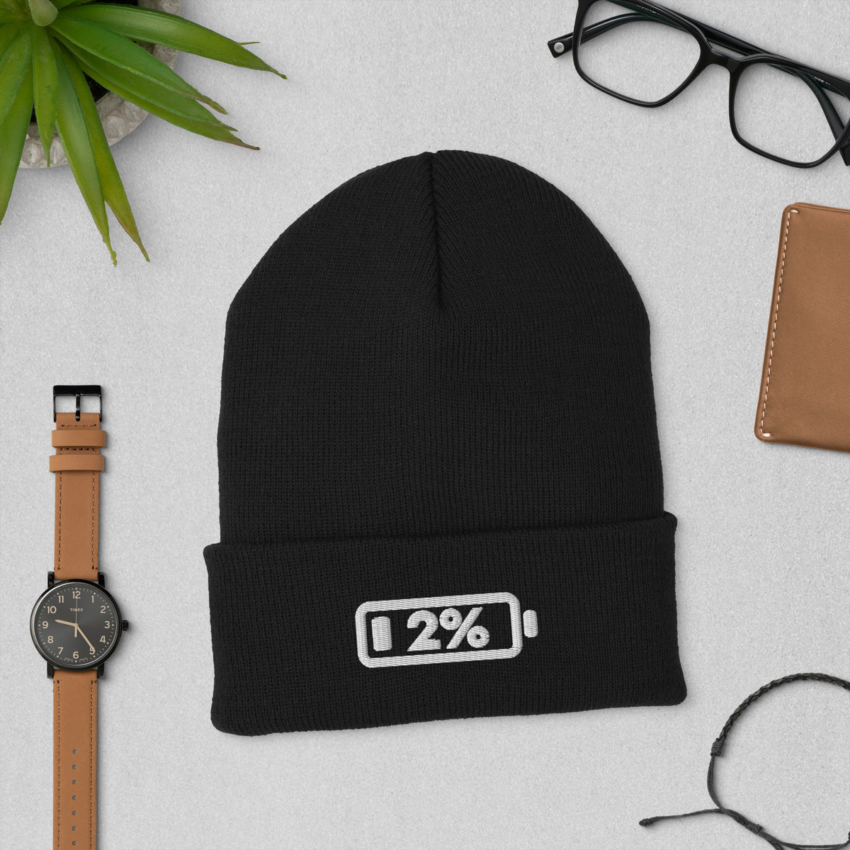 Social Battery Beanie in black, laid flat