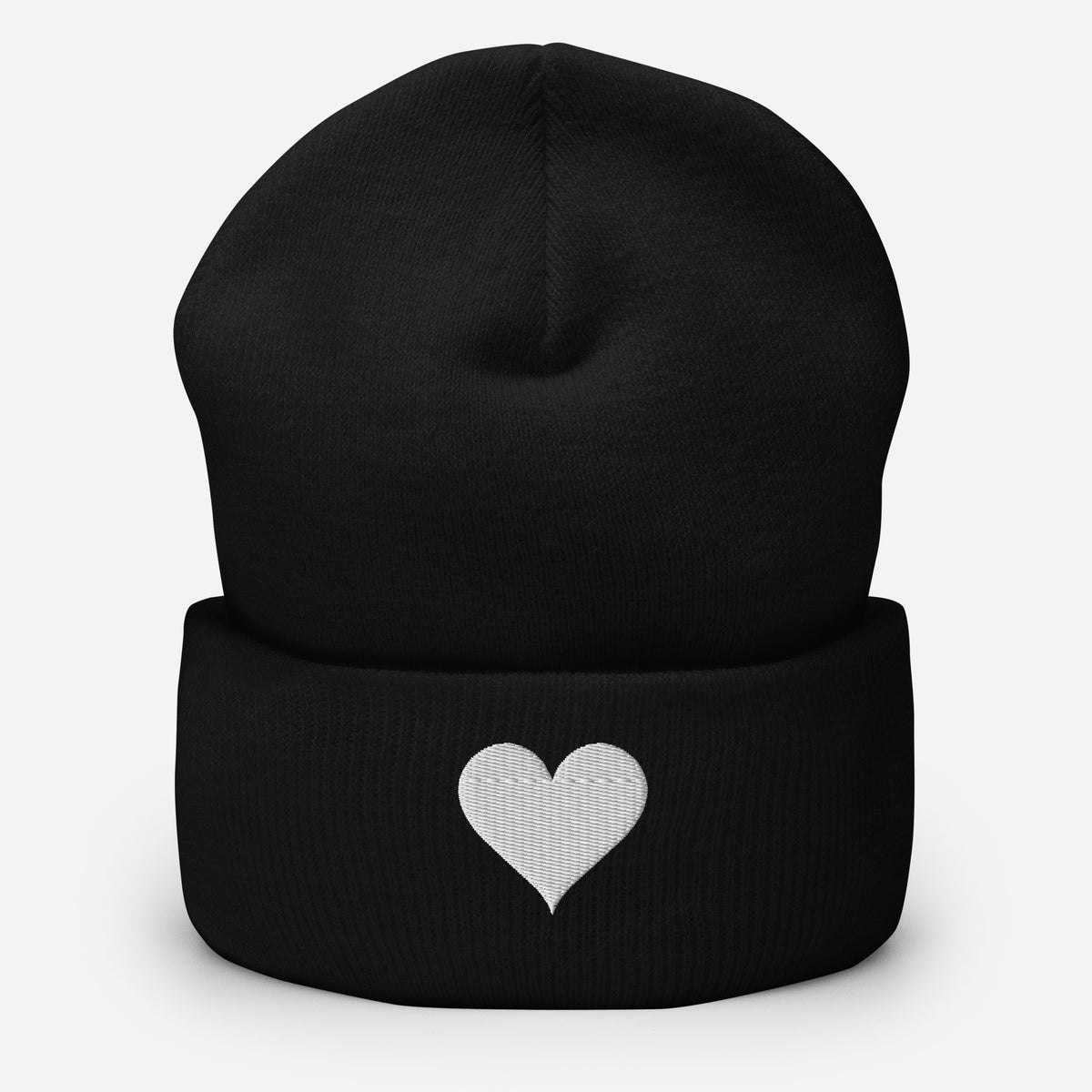 Soft Heart Beanie in black, a small heart stitched in white on the cuff