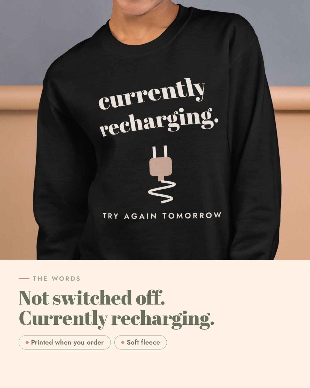 Currently Recharging Crewneck, the design up close