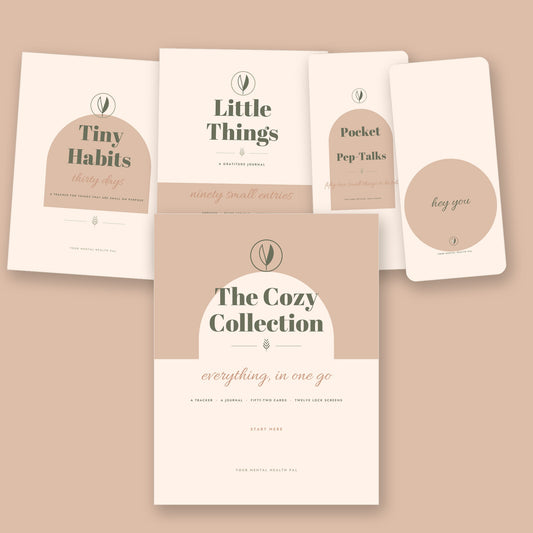 The Cozy Collection cover in front of the Tiny Habits, Little Things and Pocket Pep-Talks covers