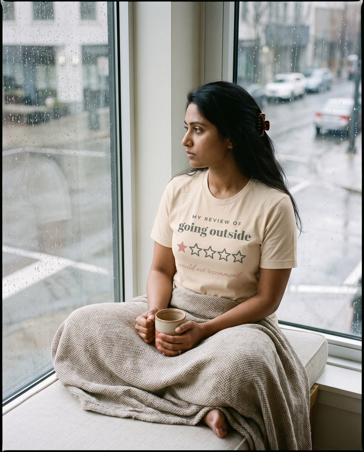 Going Outside, One Star Tee, worn on a window seat on a rainy day