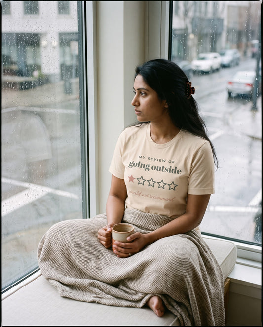 Going Outside, One Star Tee, worn on a window seat on a rainy day