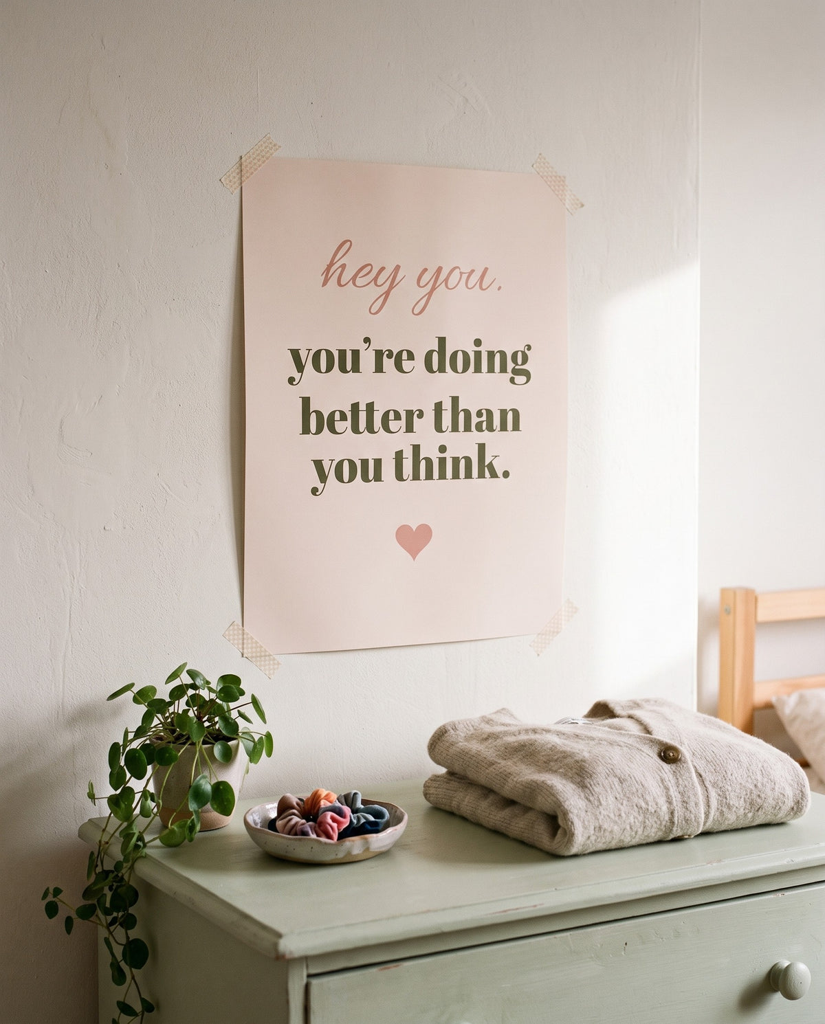 Hey You Print, unframed, taped above a bedroom dresser