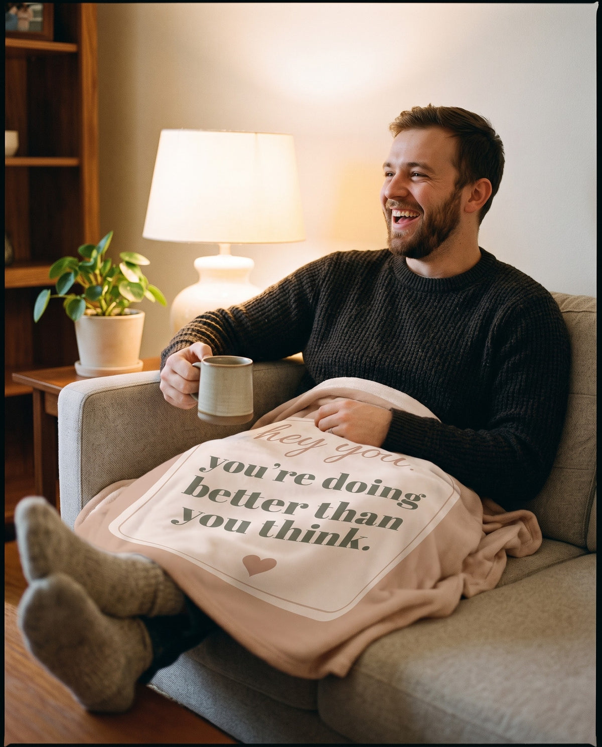 Hey You Throw, over someone's lap on the sofa