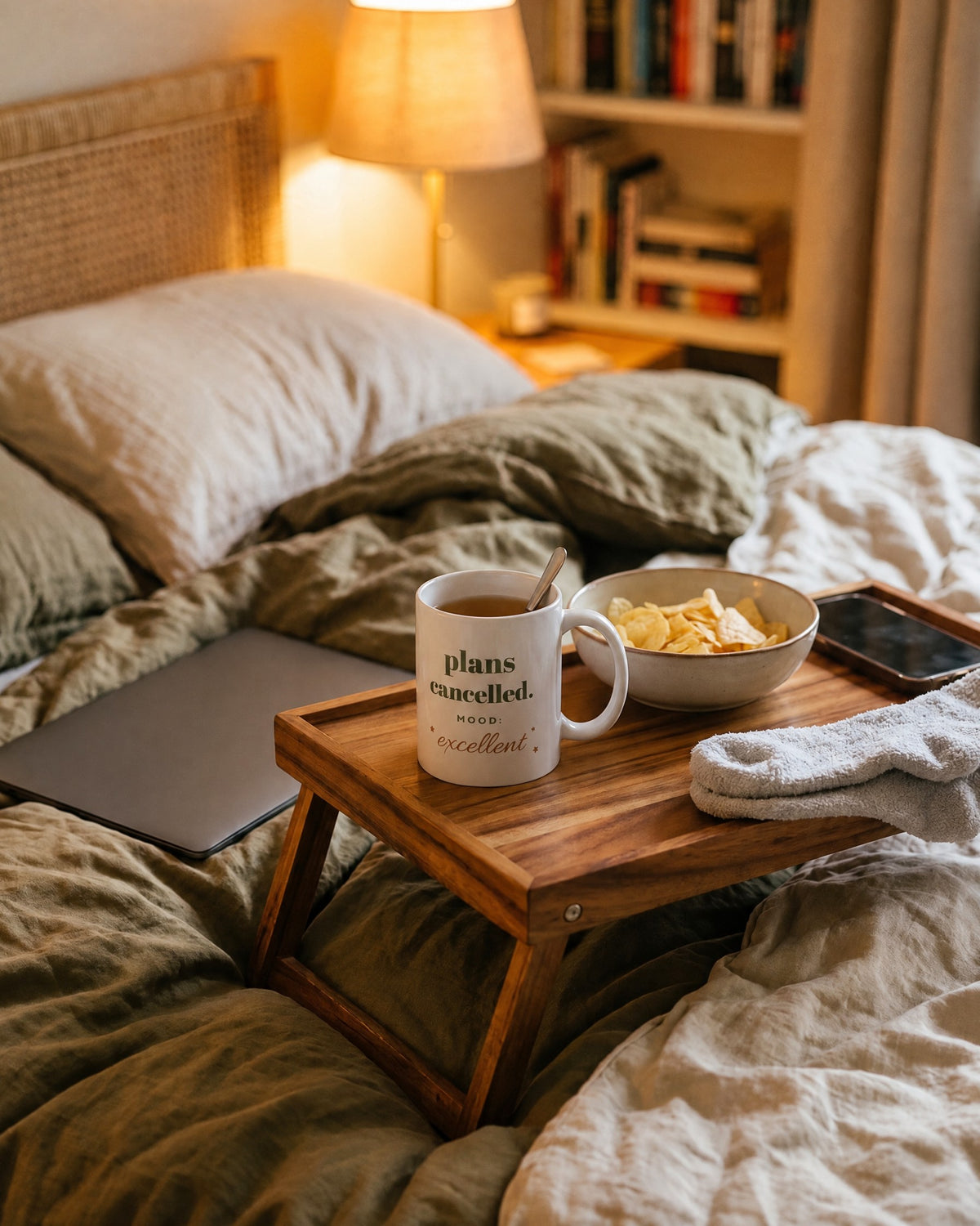 Plans Cancelled Mug, on a bed tray with crisps