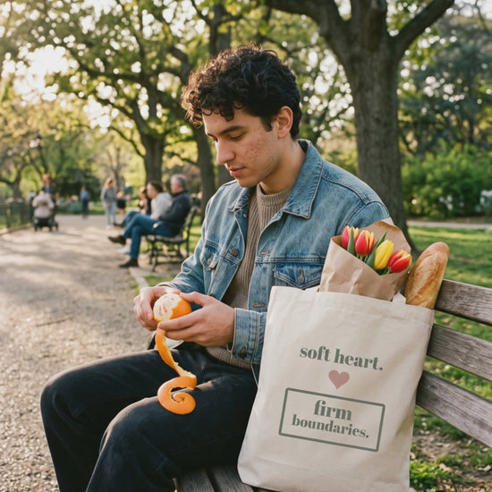 Soft Heart, Firm Boundaries Tote, a short clip of peeling an orange on a park bench