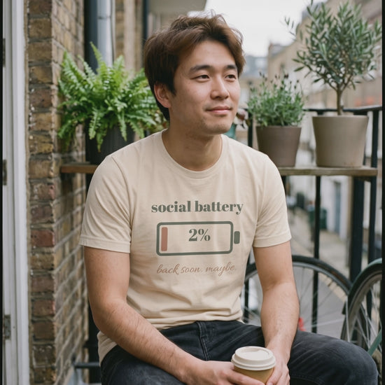 Social Battery Tee, a short clip of a slow coffee on a city balcony