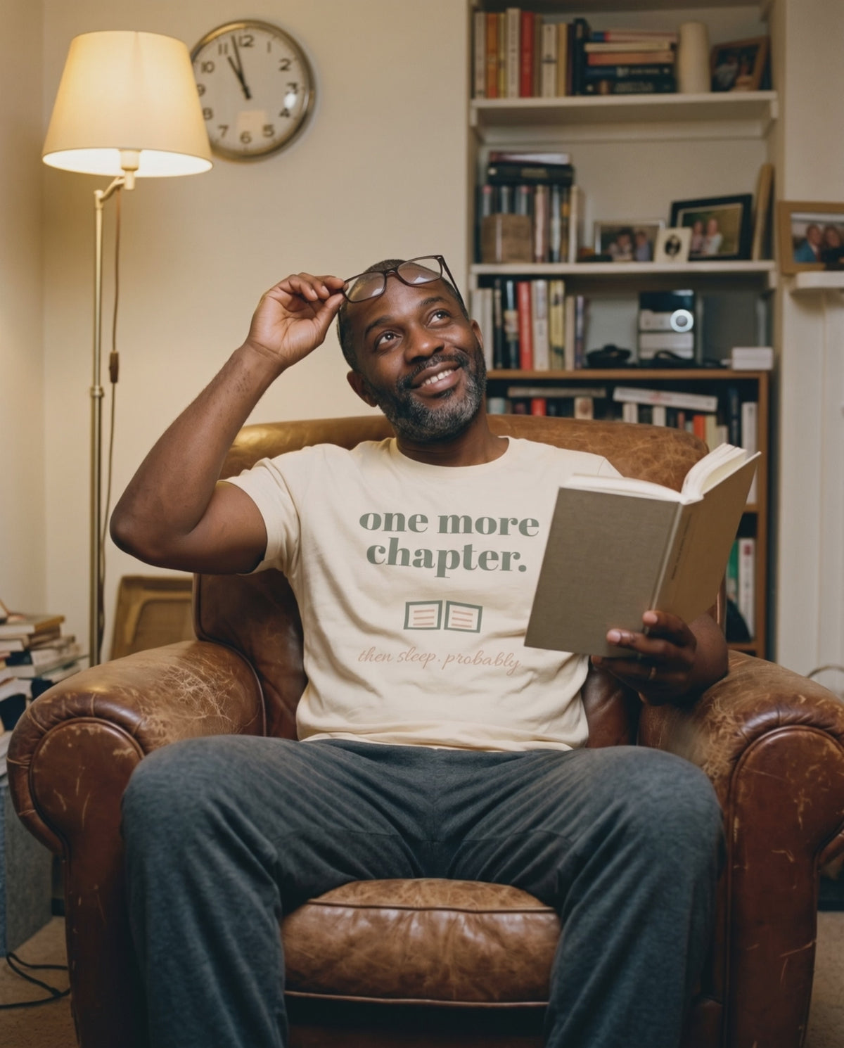 One More Chapter Tee, a short clip of turning a page in a leather armchair