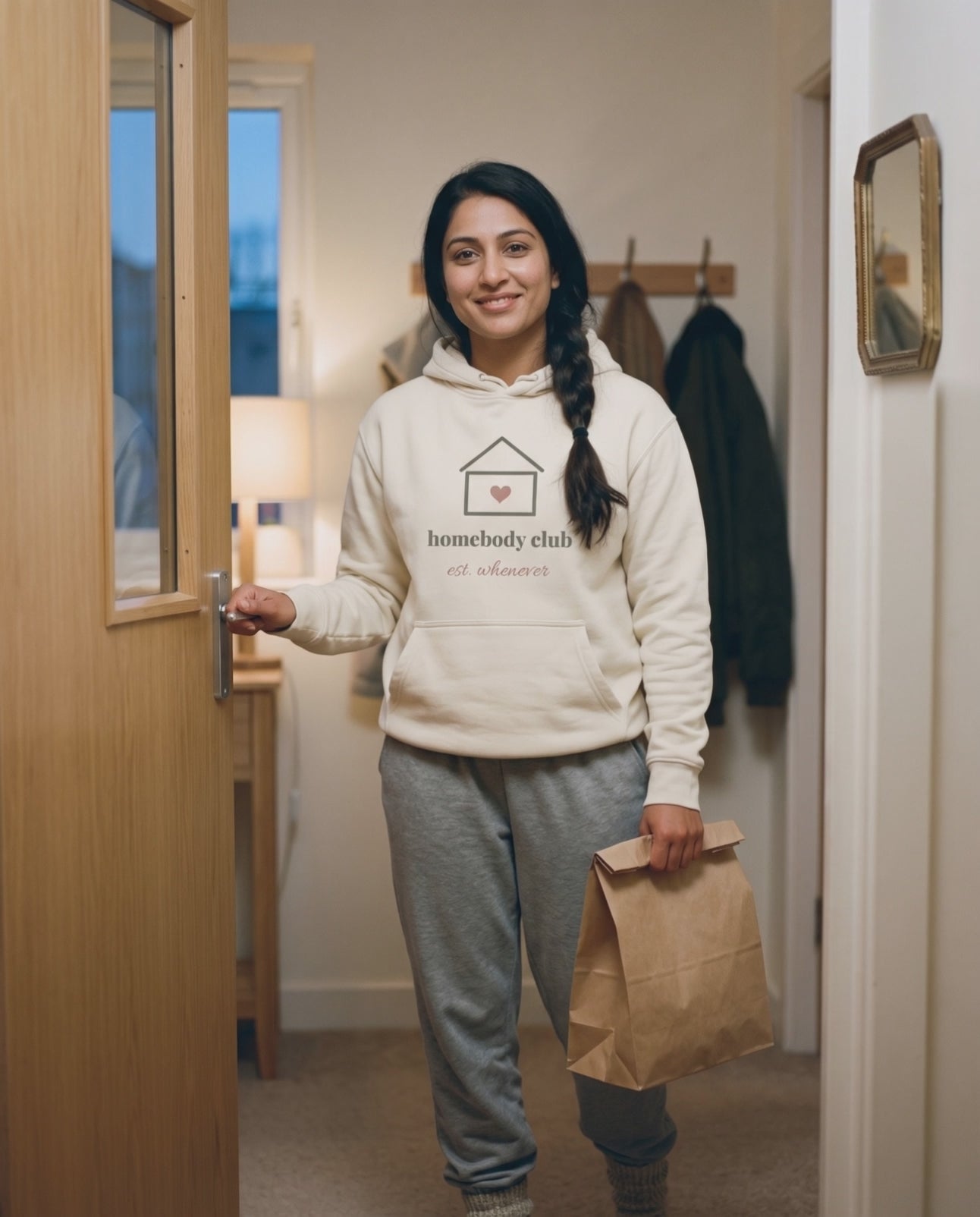 Homebody Club Hoodie, a short clip of coming home through the front door with a takeaway bag