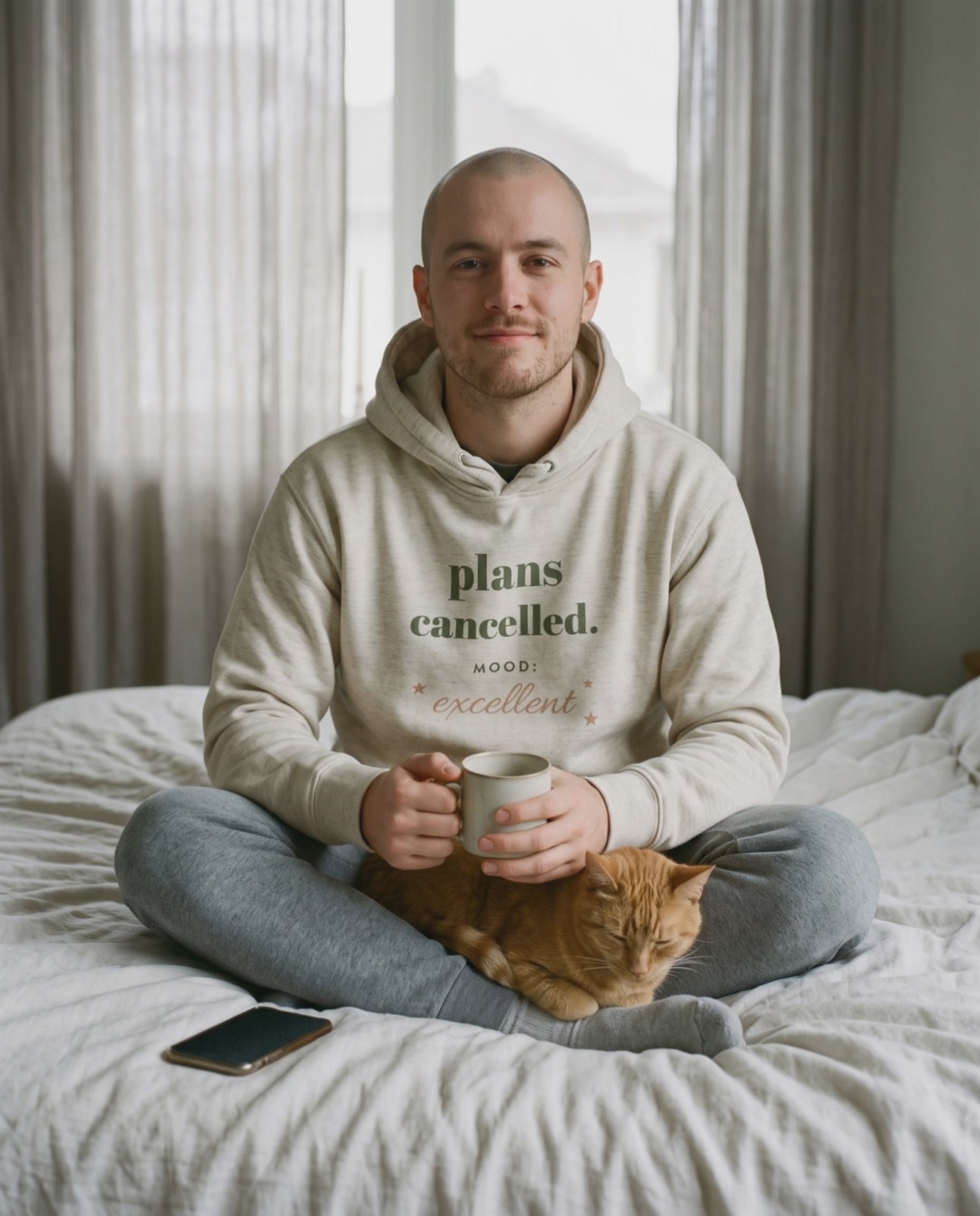 Plans Cancelled Hoodie, a short clip of a slow coffee in bed with a sleeping cat