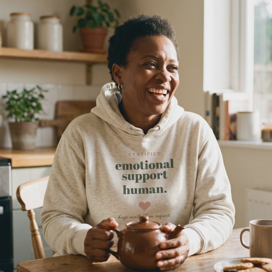 Emotional Support Human Hoodie, a short clip of laughing over a pot of tea in the kitchen