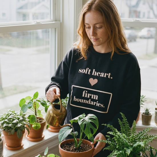 Soft Heart, Firm Boundaries Crewneck, a short clip of watering houseplants by the window