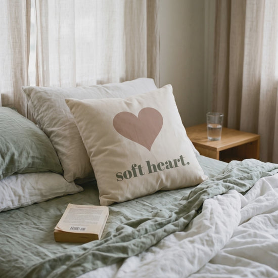 Soft Heart Pillow, a short clip of soft daylight on an unmade linen bed