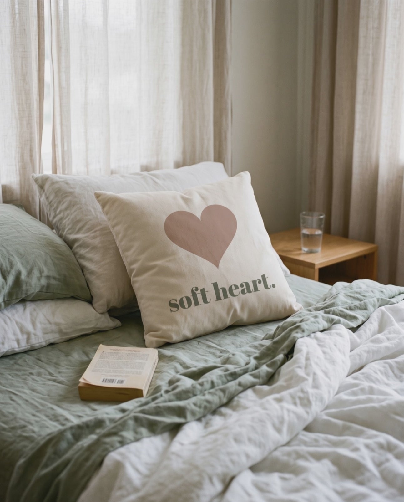 Soft Heart Pillow, a short clip of soft daylight on an unmade linen bed