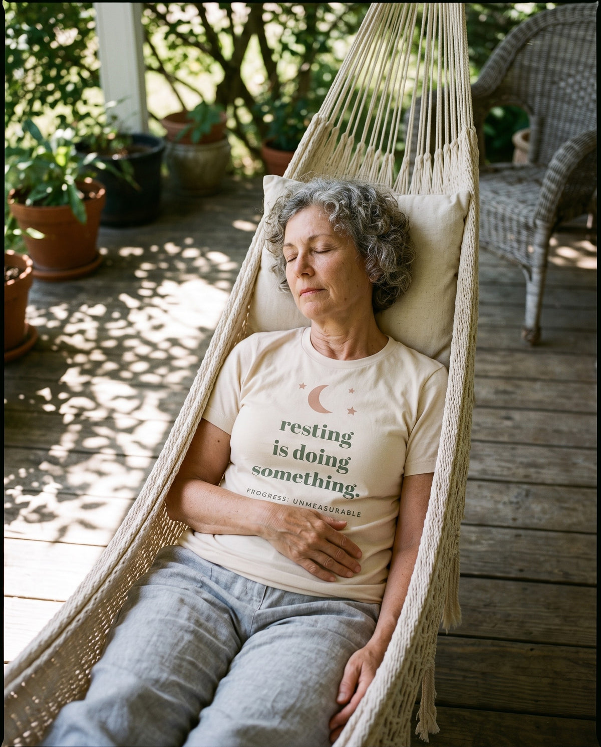 Resting Is Doing Something Tee, worn dozing in a porch hammock
