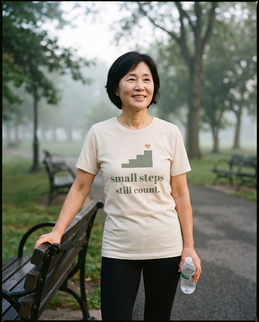 Small Steps Still Count Tee, worn on a morning walk in the park
