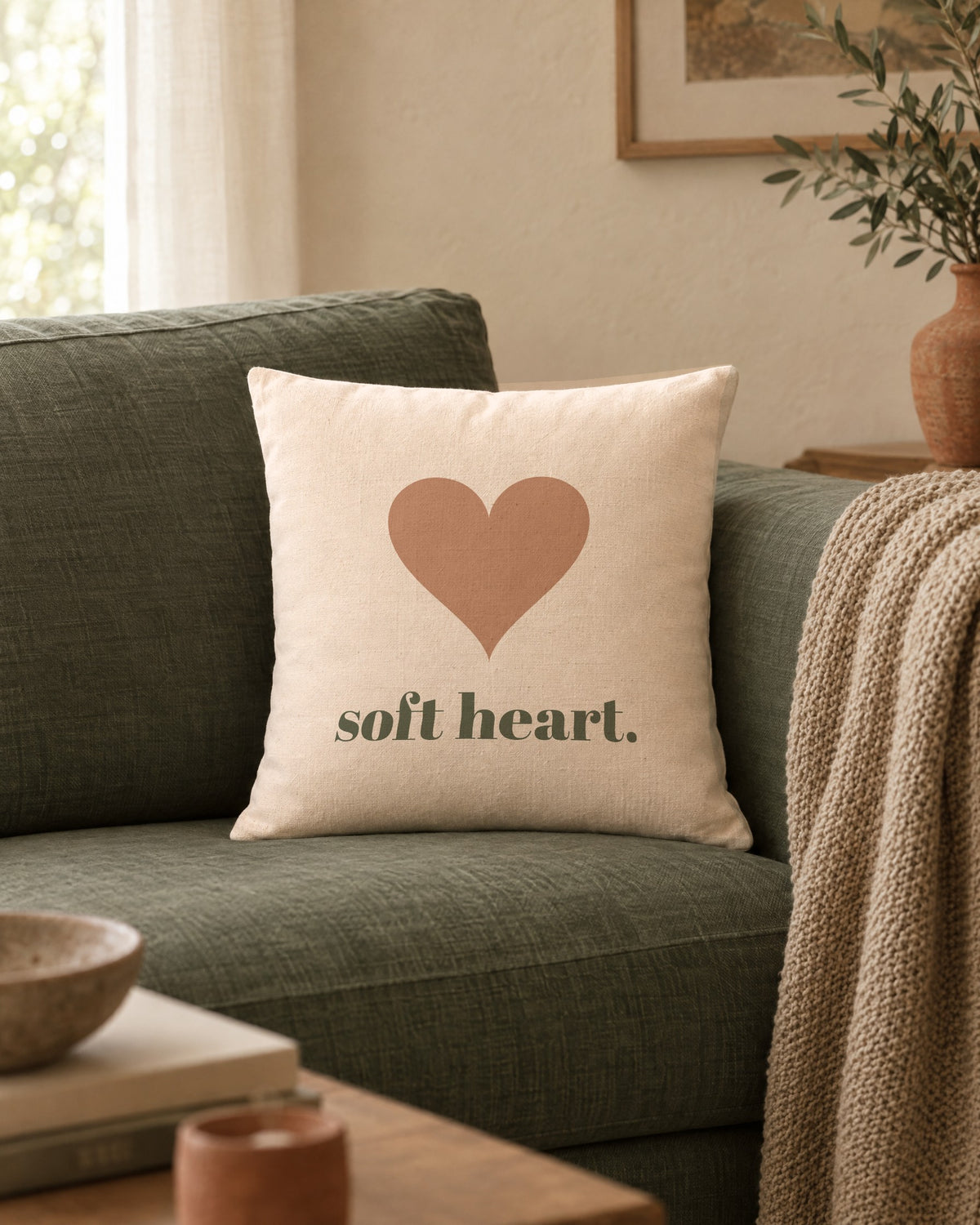 Soft Heart Pillow, 18 x 18 in, on a sage linen sofa