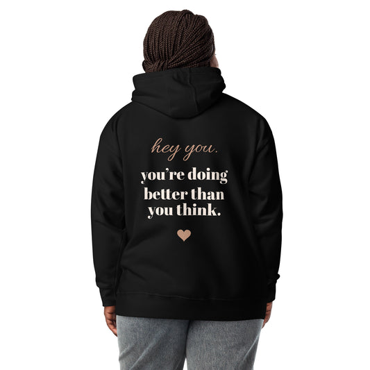 Hey You Hoodie in black, worn by a model seen from behind, showing the back print