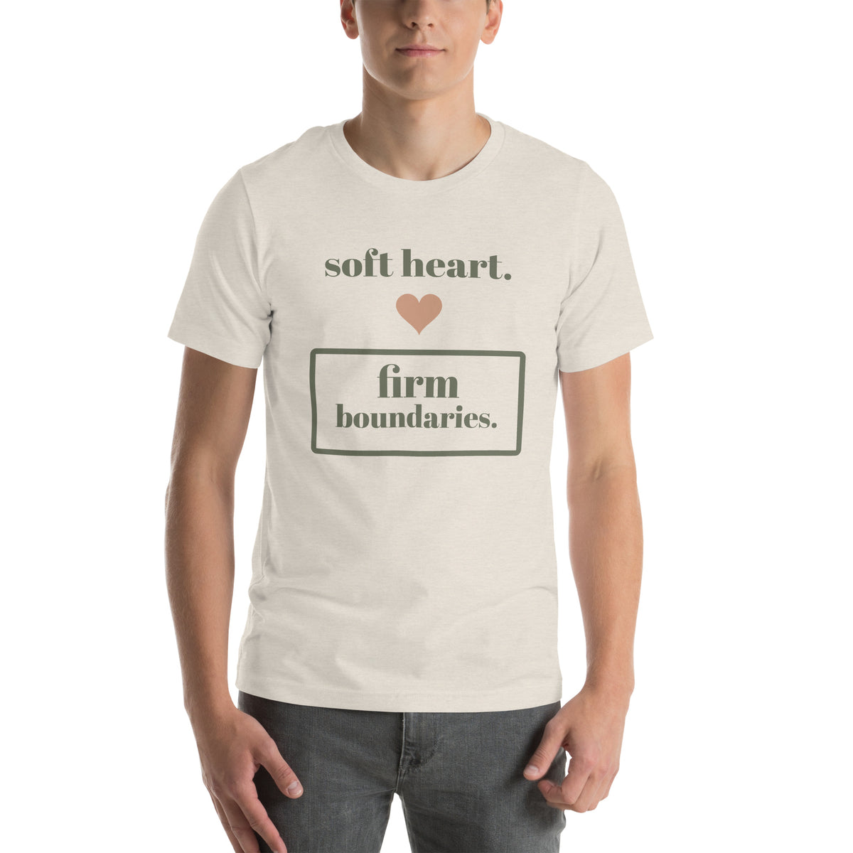 Soft Heart, Firm Boundaries Tee in Heather Dust, worn by a model, front print: soft heart, firm boundaries