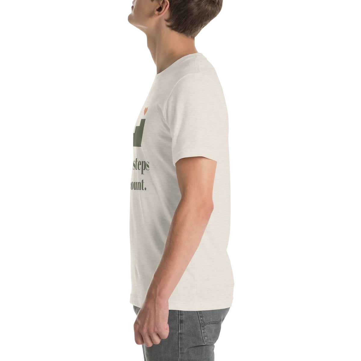 Small Steps Still Count Tee in Heather Dust, worn by a model, left side