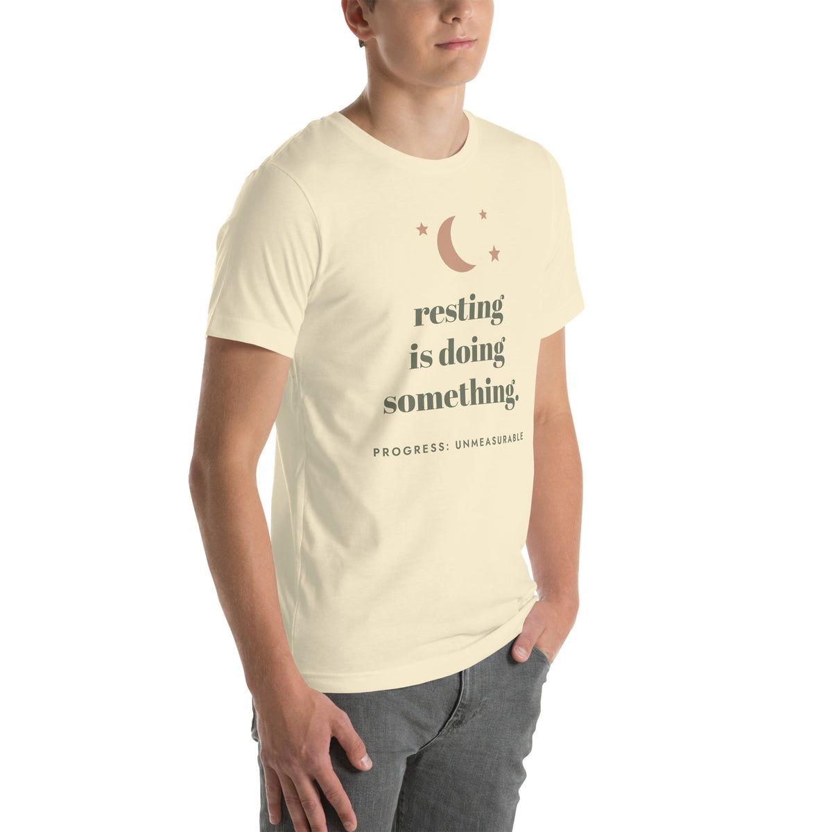Resting Is Doing Something Tee in Natural, worn by a model, three-quarter view from the right