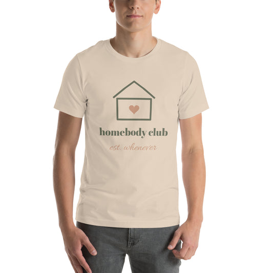 Homebody Club Tee in Soft Cream, worn by a model, front print: a small house with a heart, homebody club, est. whenever