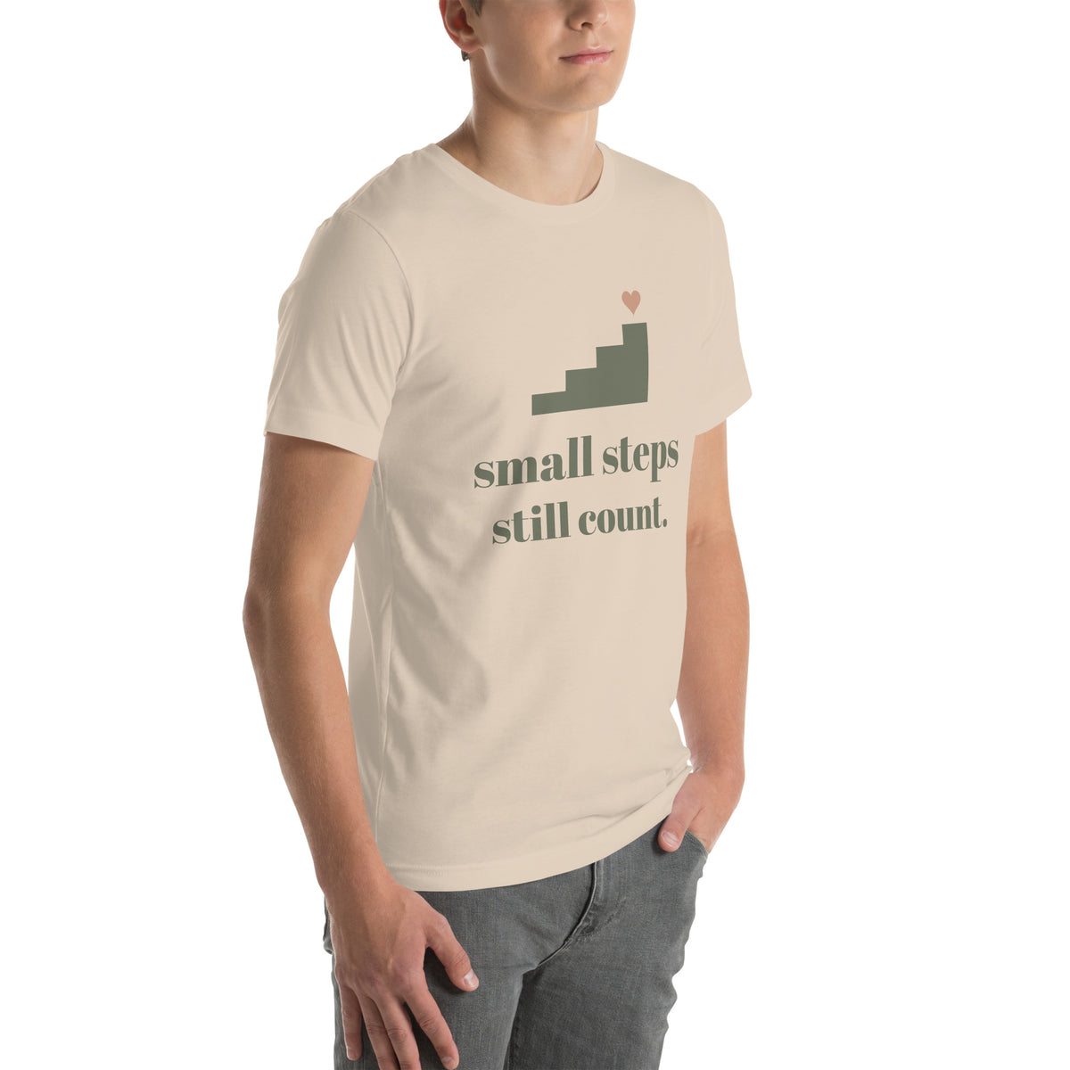 Small Steps Still Count Tee in Soft Cream, worn by a model, three-quarter view from the right